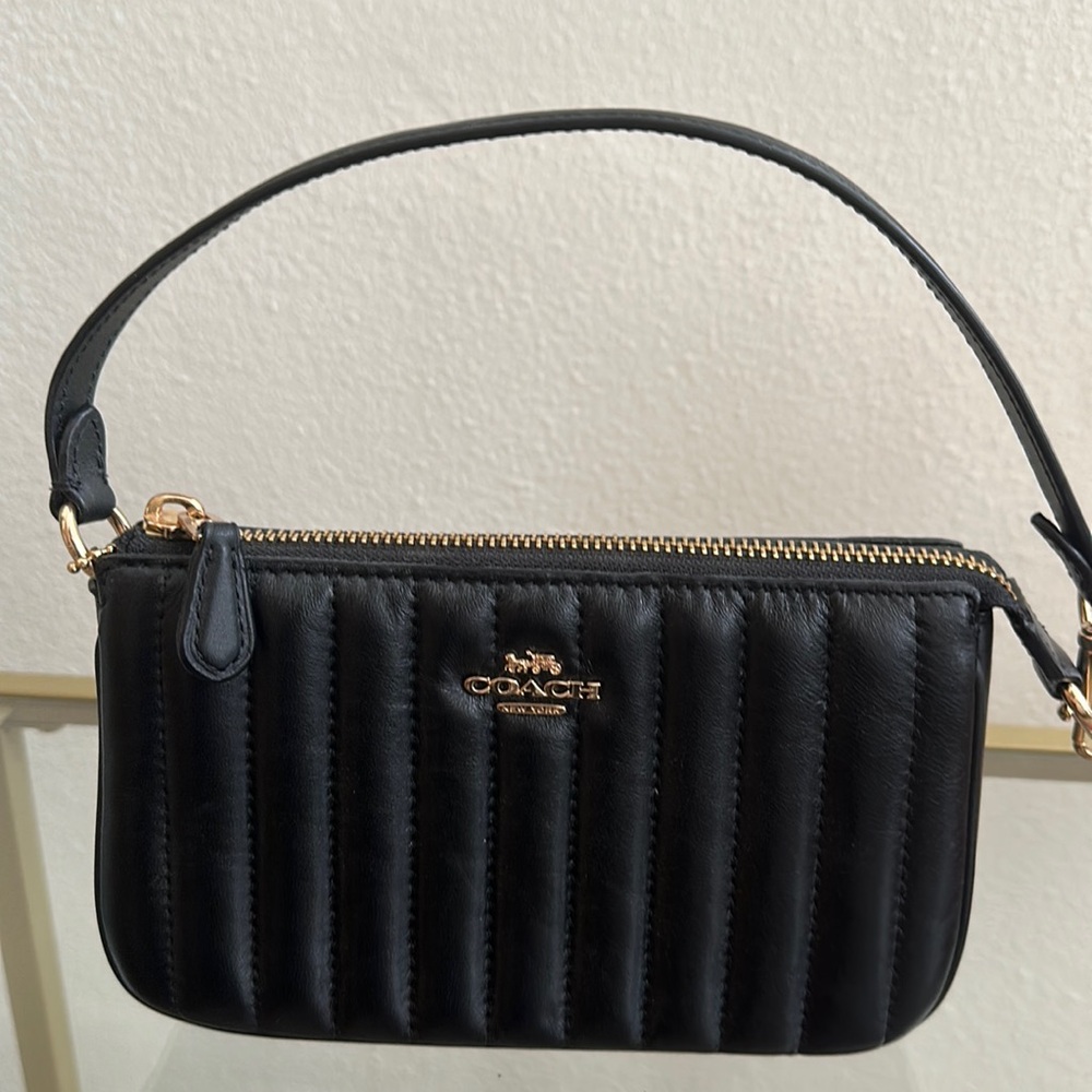 Coach Nolita 19